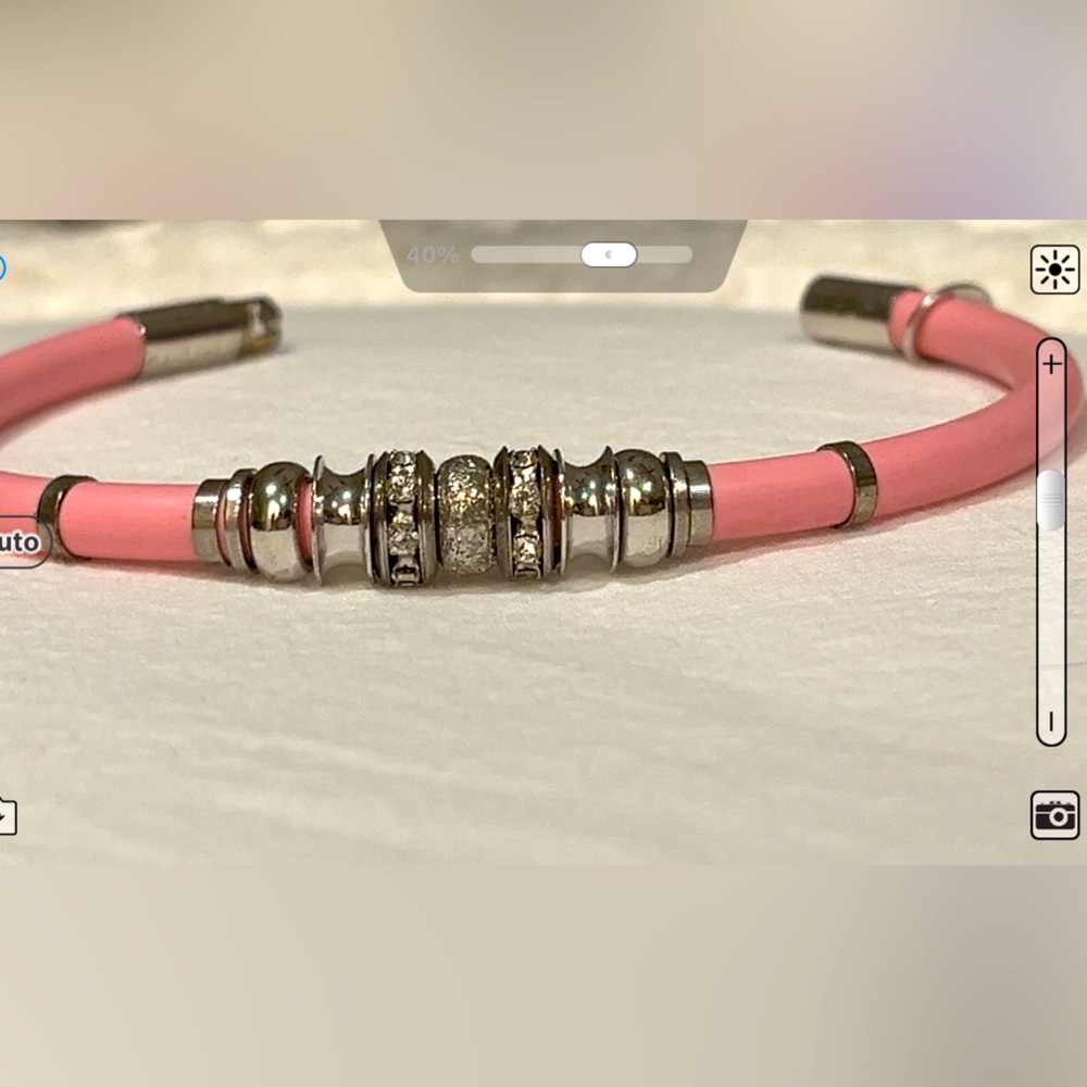 Bracelet- pink rubber band.crystal detail.